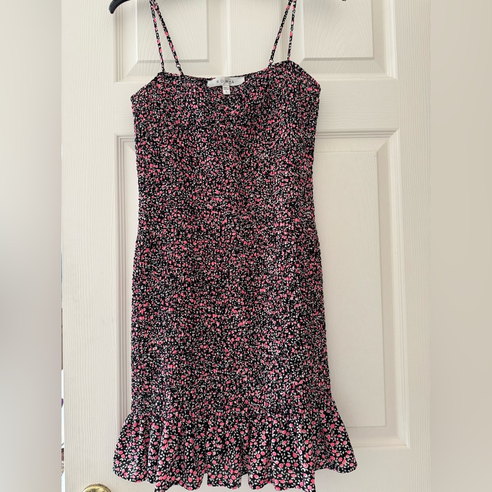 White, black, and pink dress size medium!